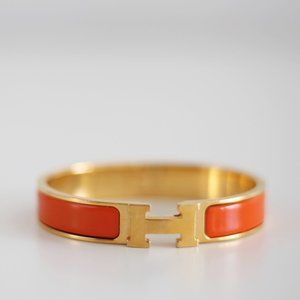 Hermes Clic H GM Enamel Bracelet in Orange Fruite & Gold HW, Very Good Condition